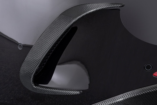 Carbon rear fascia attachments